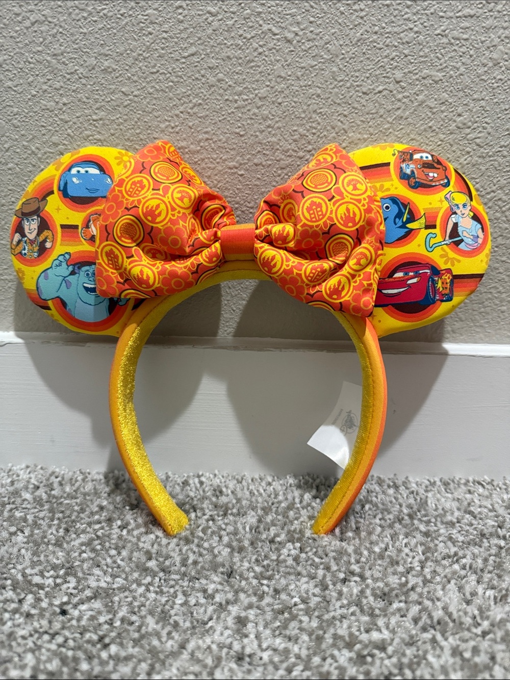 Disney Yellow & Orange Pixar Character Minnie Ear Headband with Bow